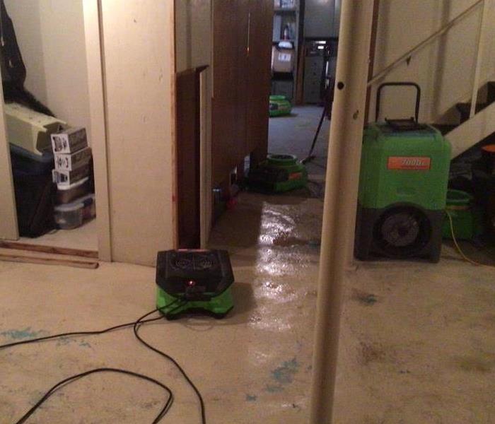zdrying equipment in unfinished basement